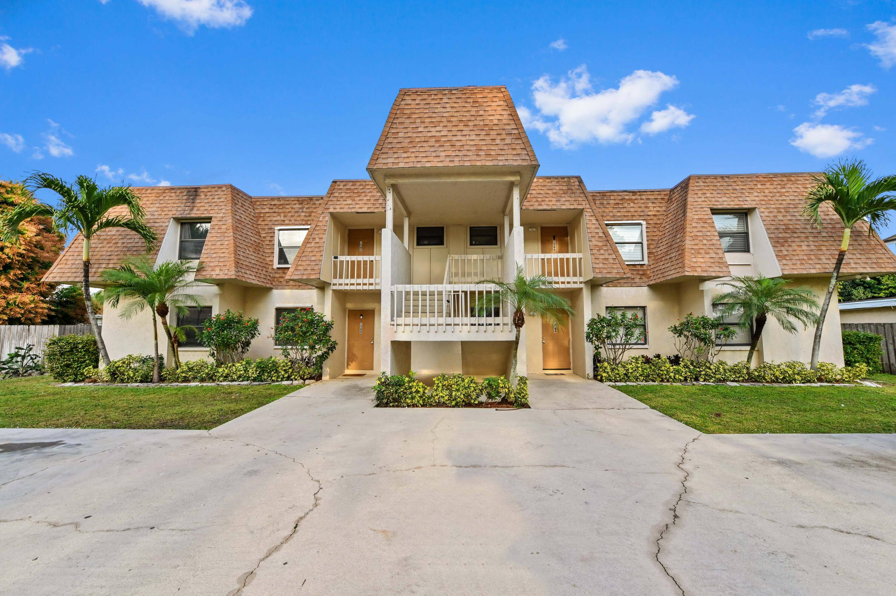 Discover a fantastic investment opportunity or a perfect place to call home with this spacious 2 bedroom, 2 bathroom per unit quadplex in the heart of Wellington.