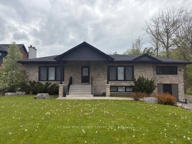 Stunning, 3 bedrm 2 Washrm custom style bungalow sitting aloft a 75 x 200 ft lot envelopd by a fleet of towering deciduous mix of trees protected by NEC w ...