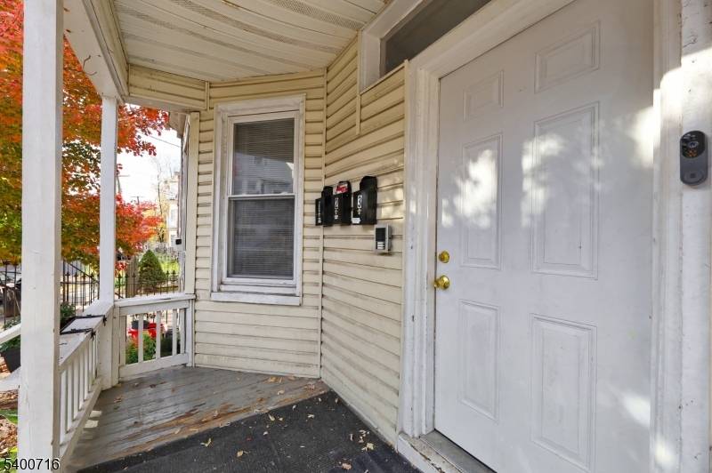 Welcome to this updated three family home in Newark.