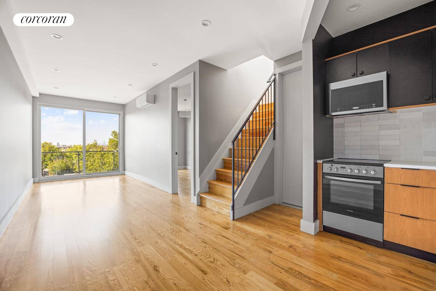 Welcome to Residence 4B a thoughtfully crafted two bedroom, one bathroom penthouse offering 742 square feet of sun soaked living space in Crown Heights.