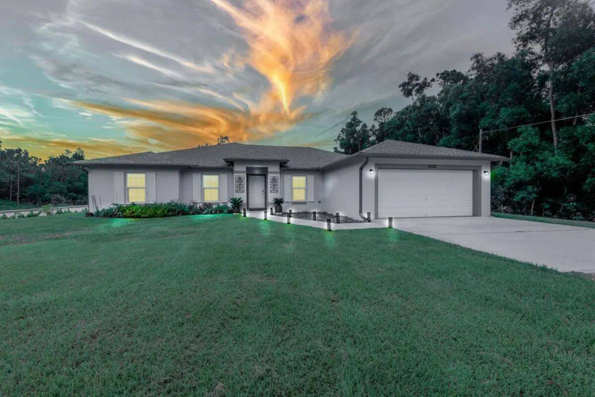 STUNNING 4 bedroom 3 full bath on a corner lot.