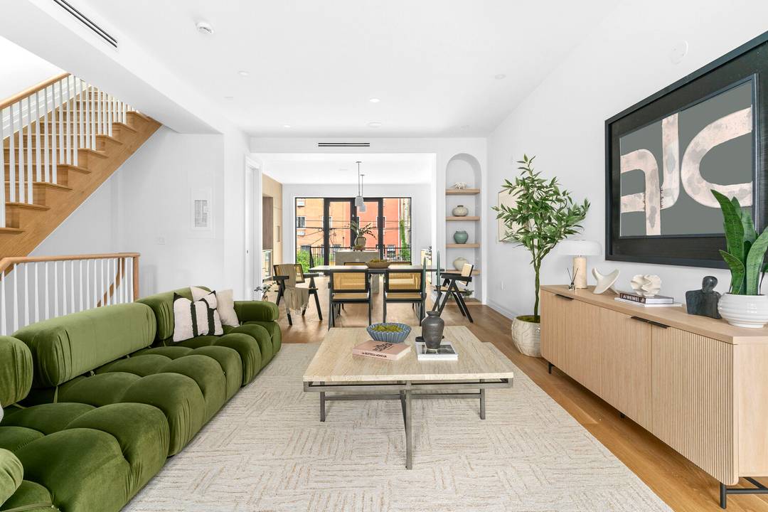 Step into a world of elevated living with this exceptional 20 foot wide, 3, 551 square foot Brooklyn estate a masterfully reimagined two family townhouse that fuses classic elegance with ...