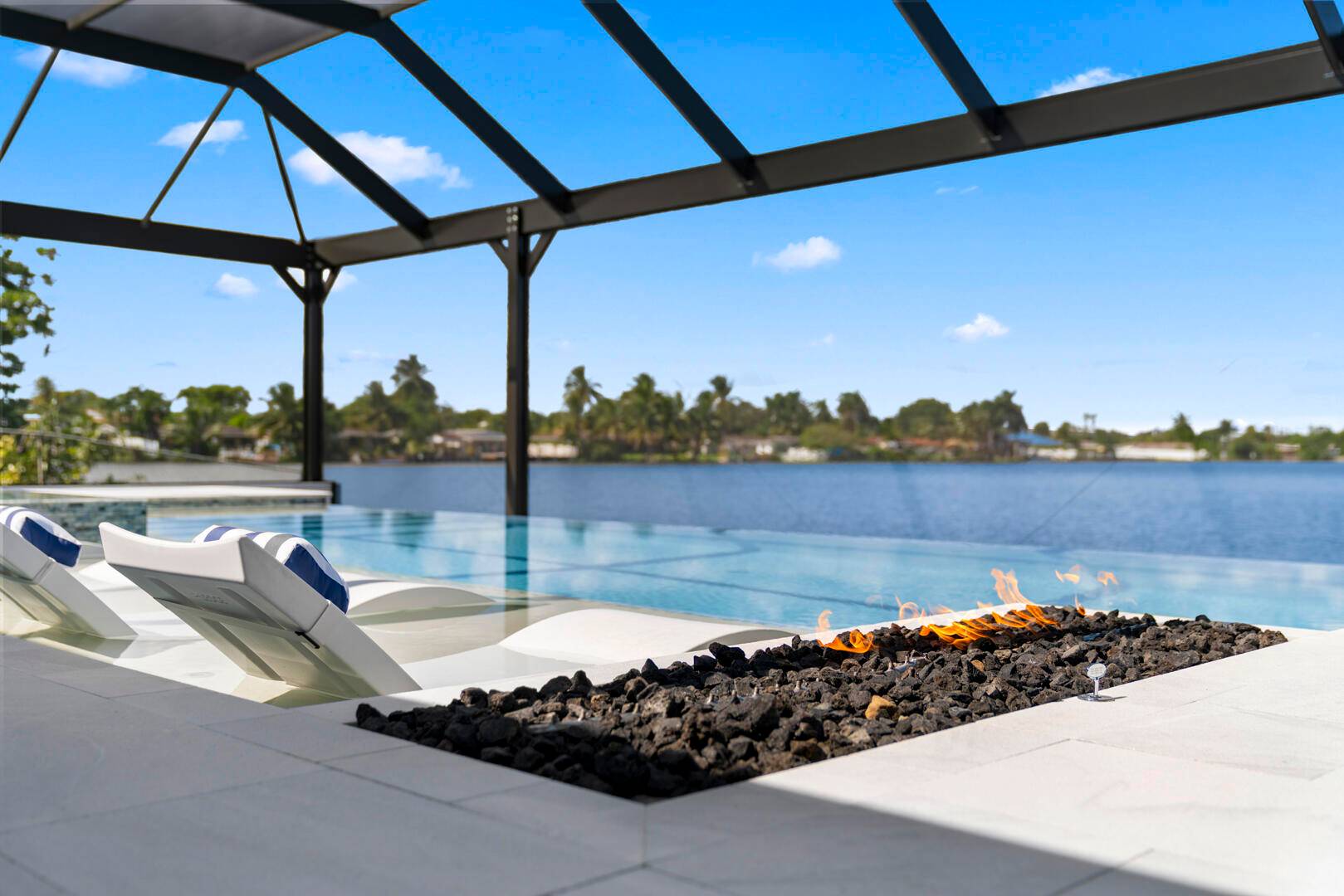 Stunning 4 bedroom, 4. 5 bath lakefront home featuring a rare panoramic lake view a true Miami gem !