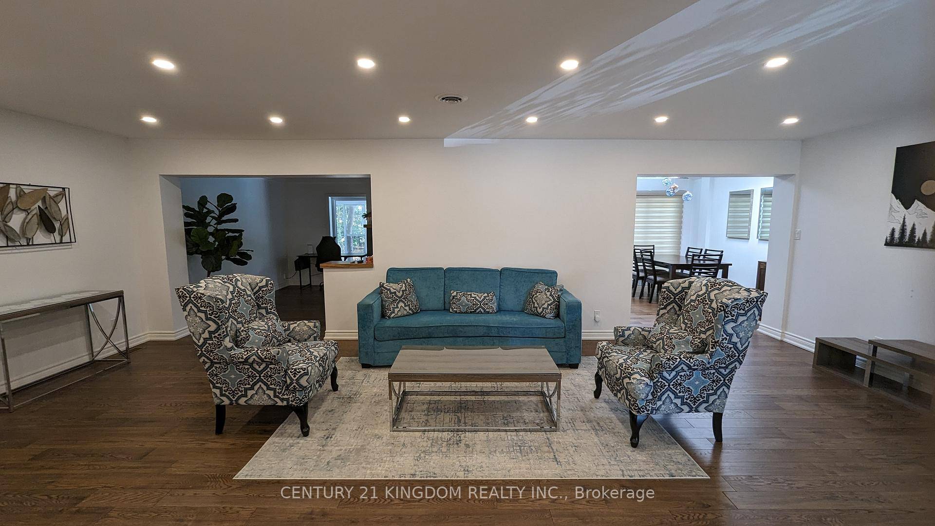 Massive main floor raised bungalow with separate laundry in the basement and a Modern gourmet kitchen and large island.
