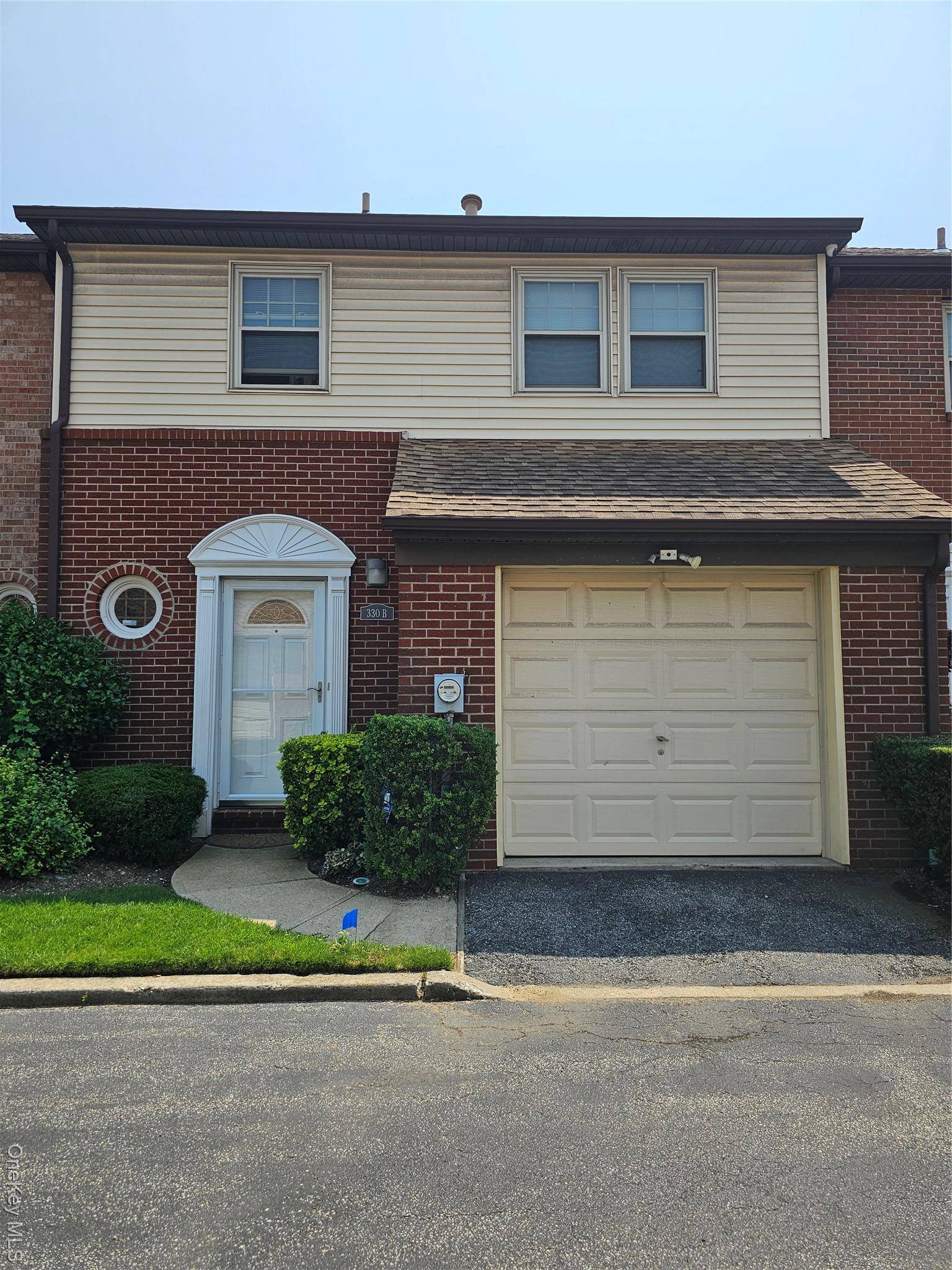 Move right into this two level townhouse featuring a formal living and dining room, an updated kitchen with granite countertops and stainless steel appliances.