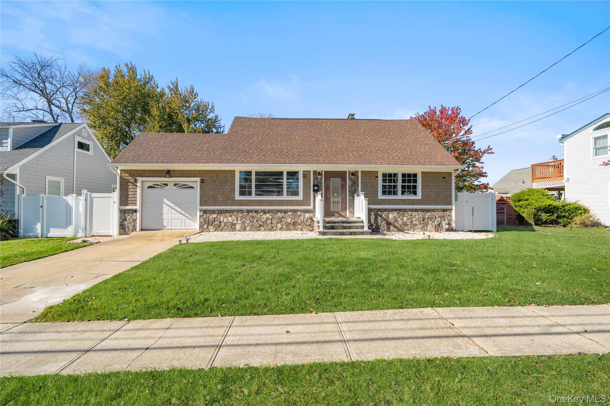 Welcome to this Beautifully Renovated North Hicksville Home Featuring 3 Bedrooms, 2 Updated Full Baths, and a Fully Finished Basement.