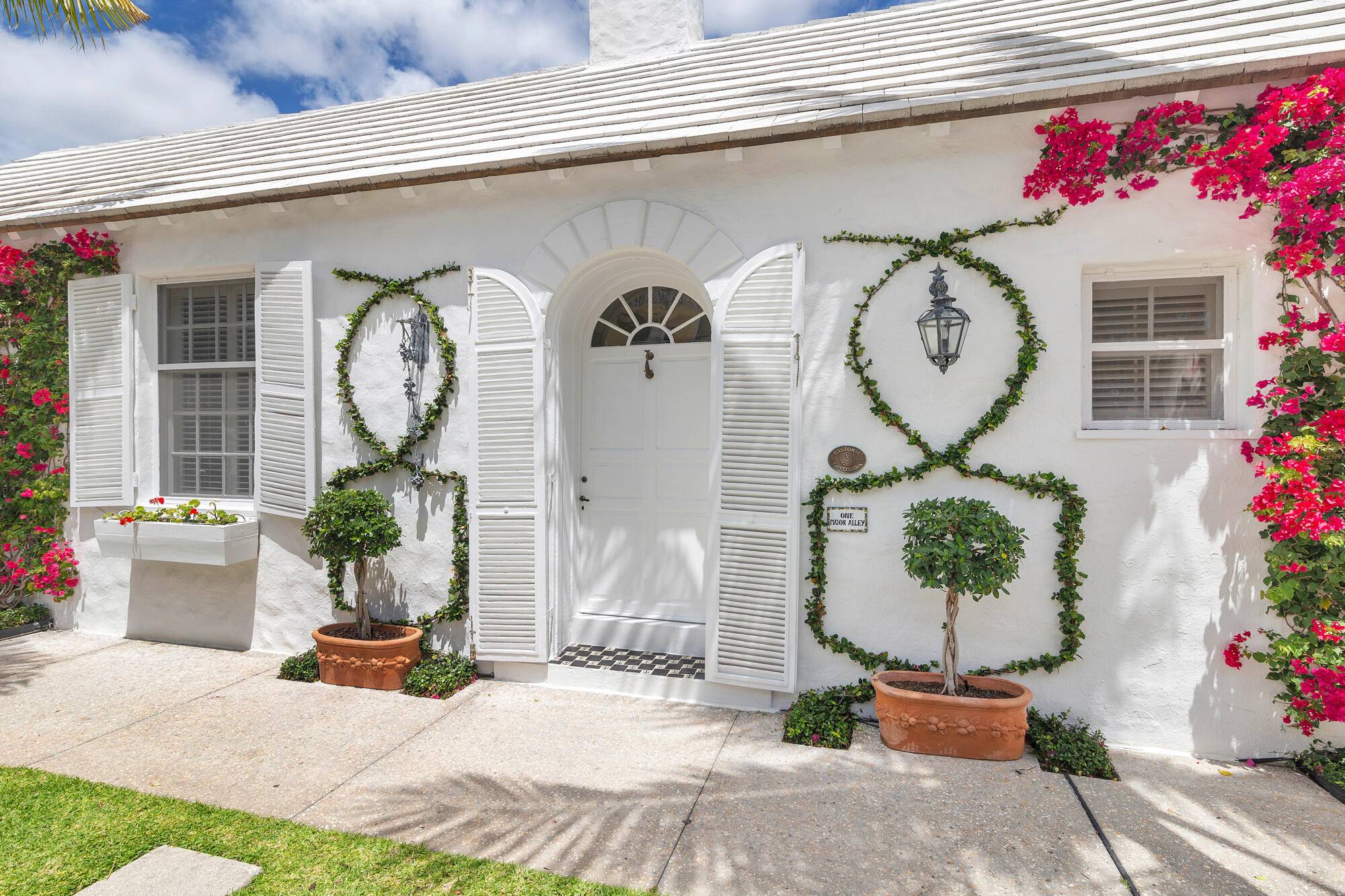 As charming as Palm Beach gets, everyone is fascinated by the six side by side townhomes of Major Alley.