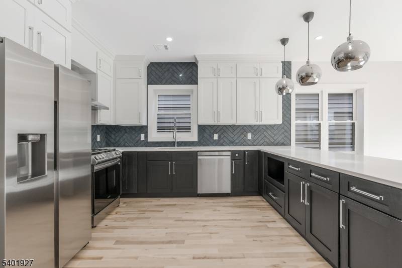 Welcome to this stunning new construction multi family home.