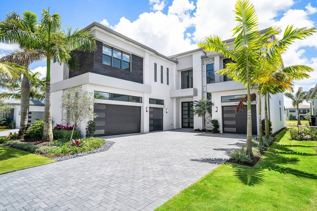 Welcome to refined modern luxury, resort style living in one of Boca Raton's most prestigious, guard gated communities.