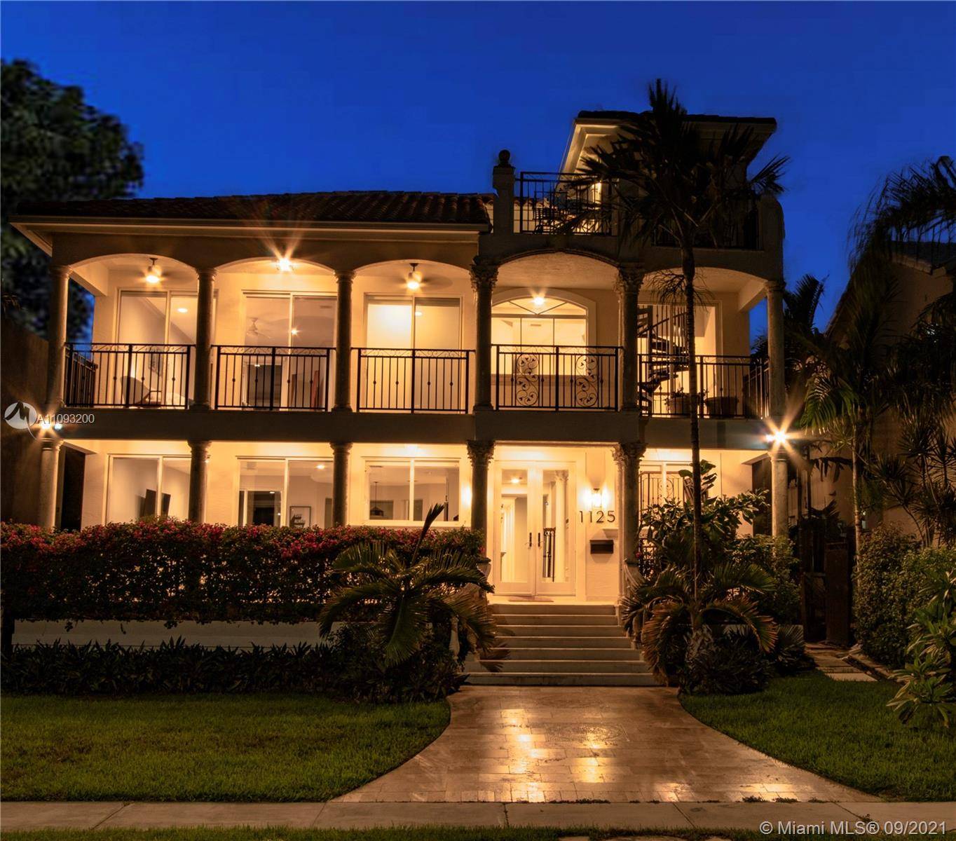 Welcome to Palm Breeze ! Carefree Key West meets Mediterranean Grandeur in this Lake Belmar waterfront estate home.