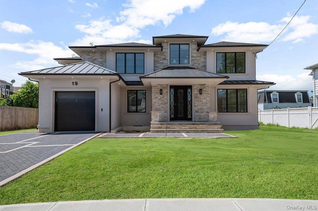 Welcome to 19 Maple Avenue, a stunning brand new construction located in the heart of Cedarhurst.