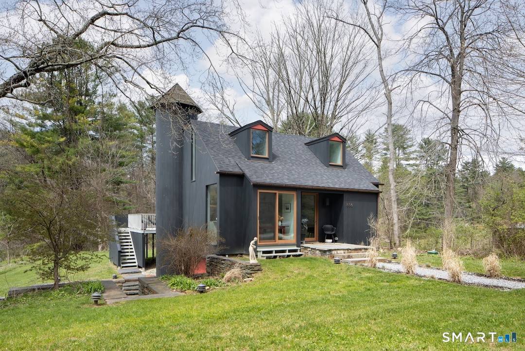 Modernist retreat in a pastoral Berkshire setting an artful sanctuary where design, landscape, and light exist in quiet harmony.