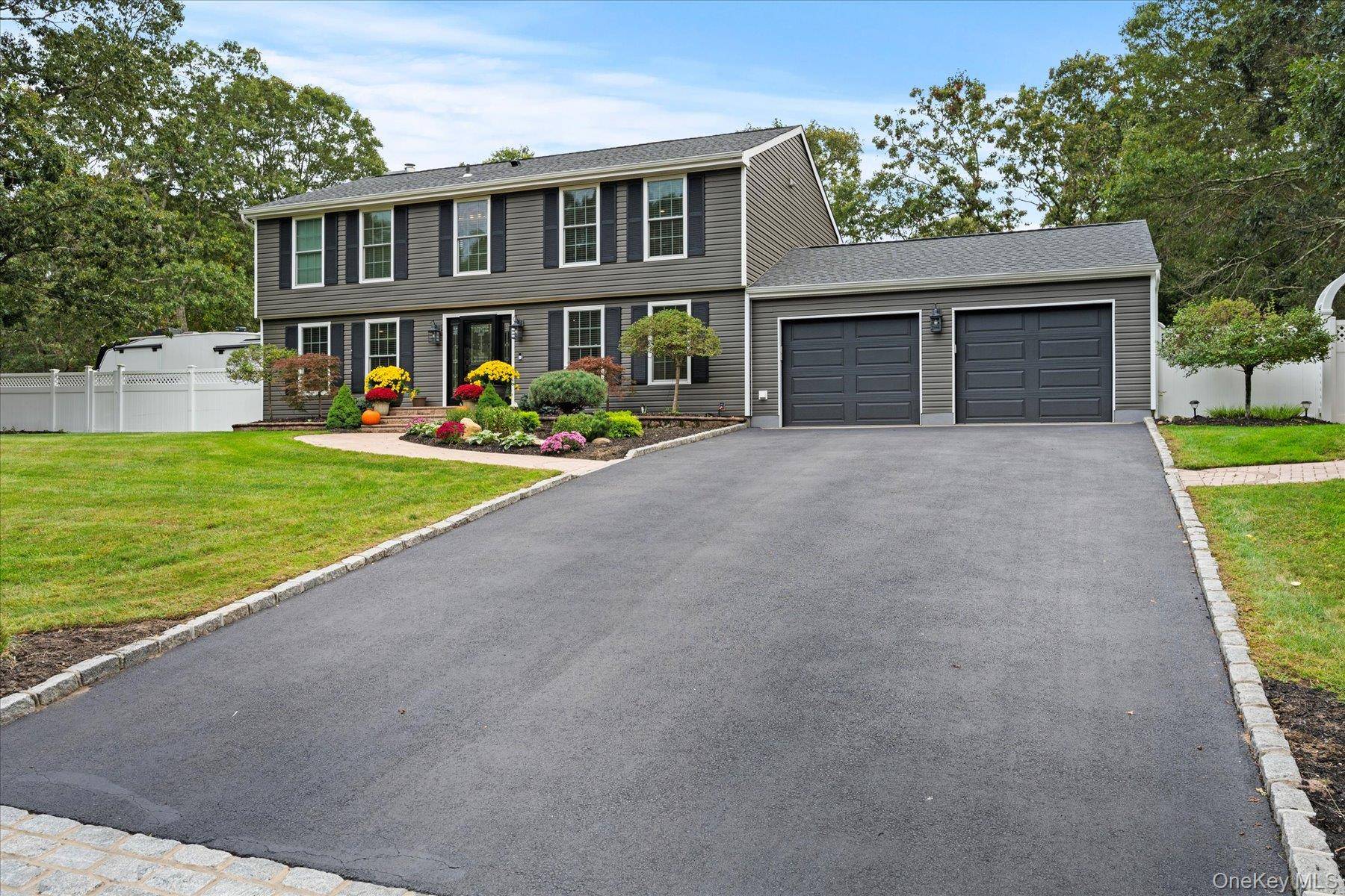 Spectacular Home nestled on corner lot in Manorville minutes away from the gateway to the Hamptons.