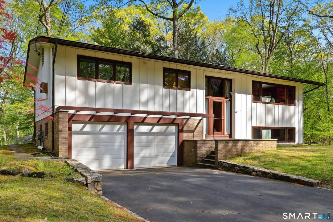 Nestled on a private one acre setting in sought after North Stamford, this four bedroom raised ranch offers the perfect balance of space, comfort, and privacy just 10 minutes from ...