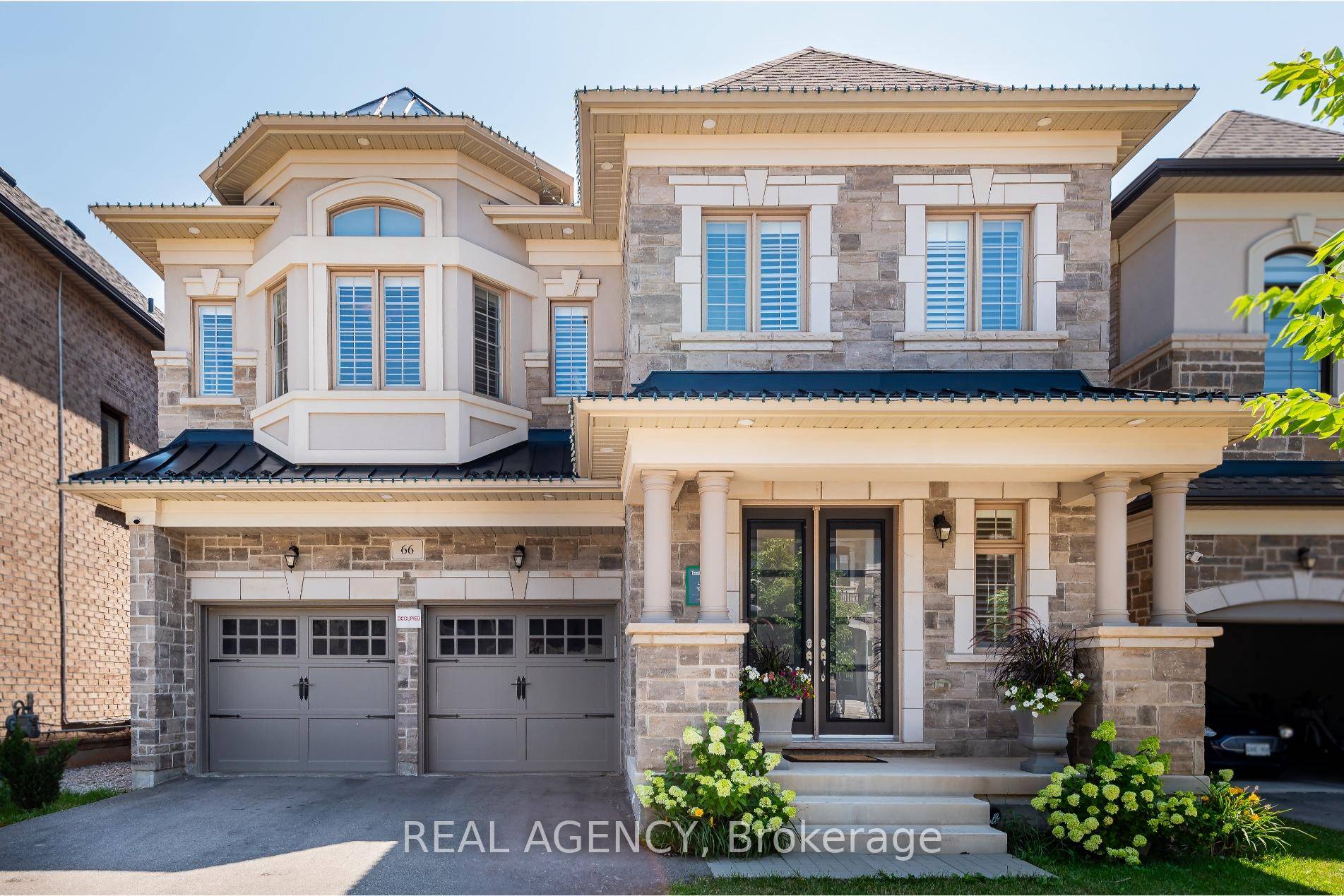 Stunning 5 Bedroom Executive Home in The Oakes over 4500 Sq Ft of finished Luxury Living space.