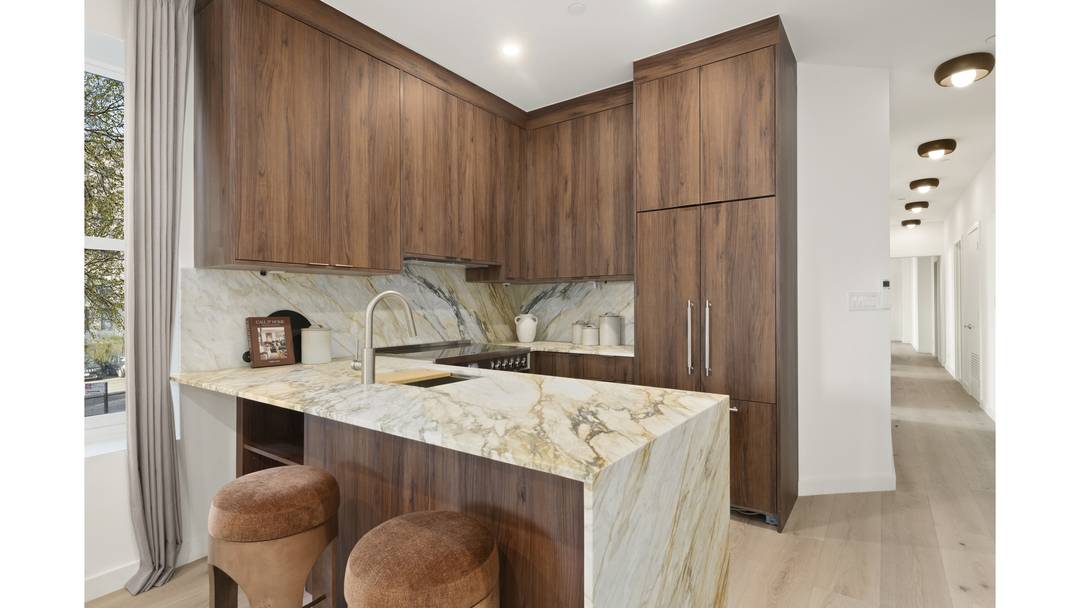 Park Slope living is beautifully realized in this expansive four bedroom, three bathroom floor through condominium offering exceptional light, refined finishes and private outdoor space.