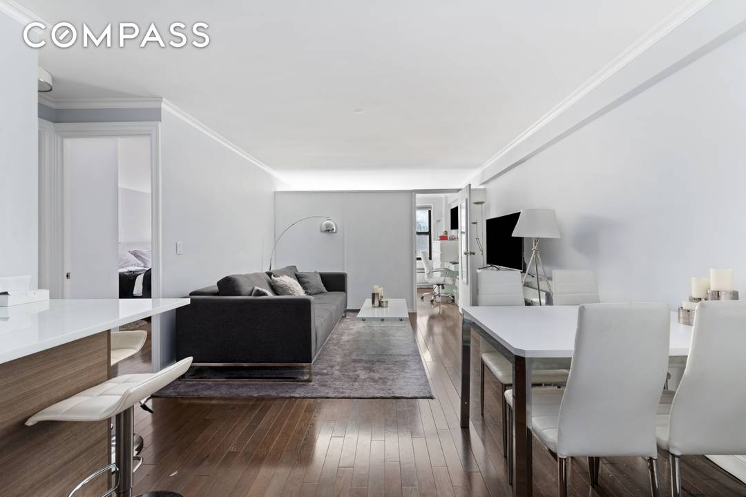 Residence 10H at the Devon Condominium is a stunning oversized 1 Bedroom that is currently used as a 2 Bedroom.