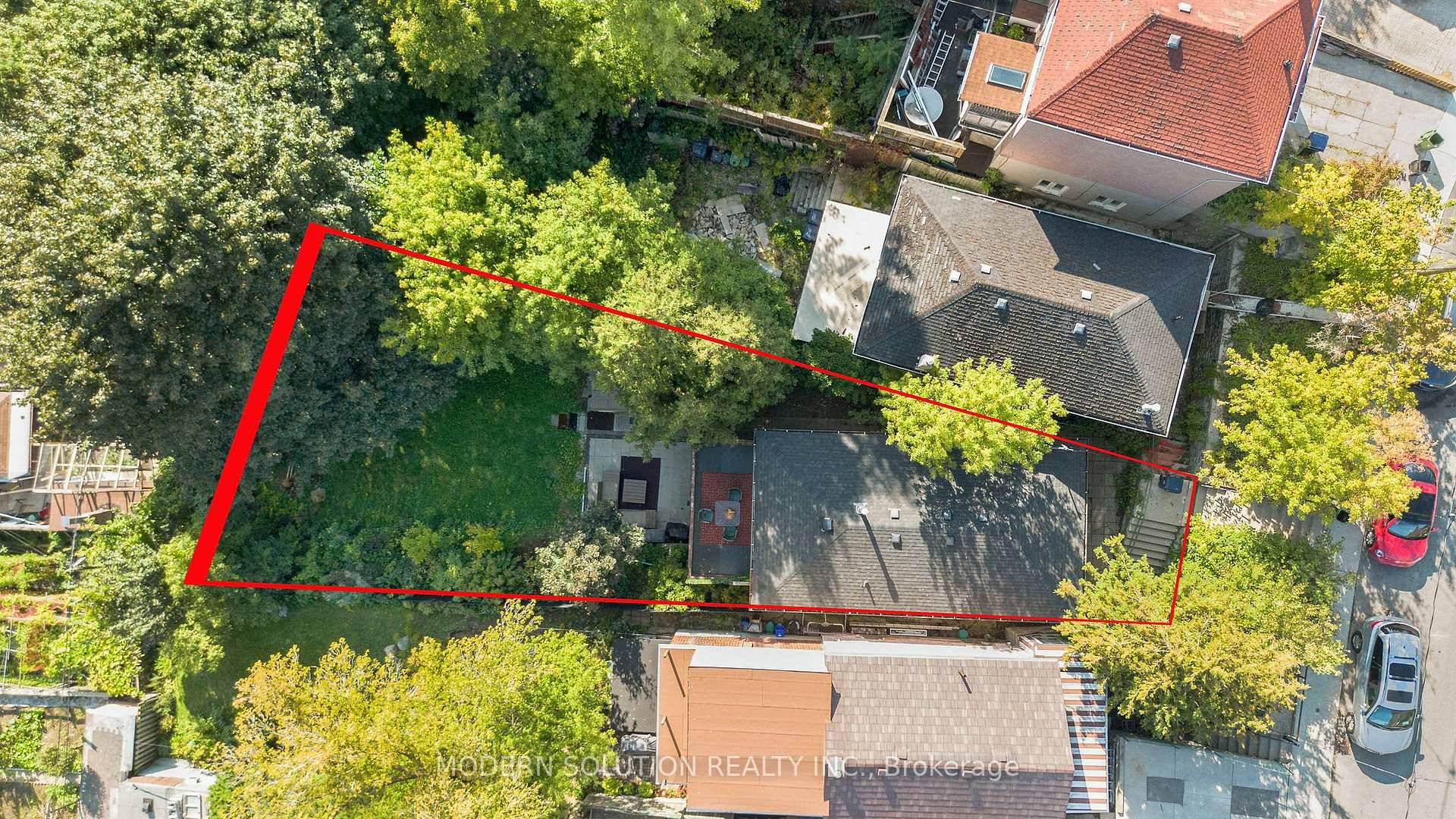 This charming south facing bungalow sits on a lot that widens to 48 ft at the back, offering both space and serenity.