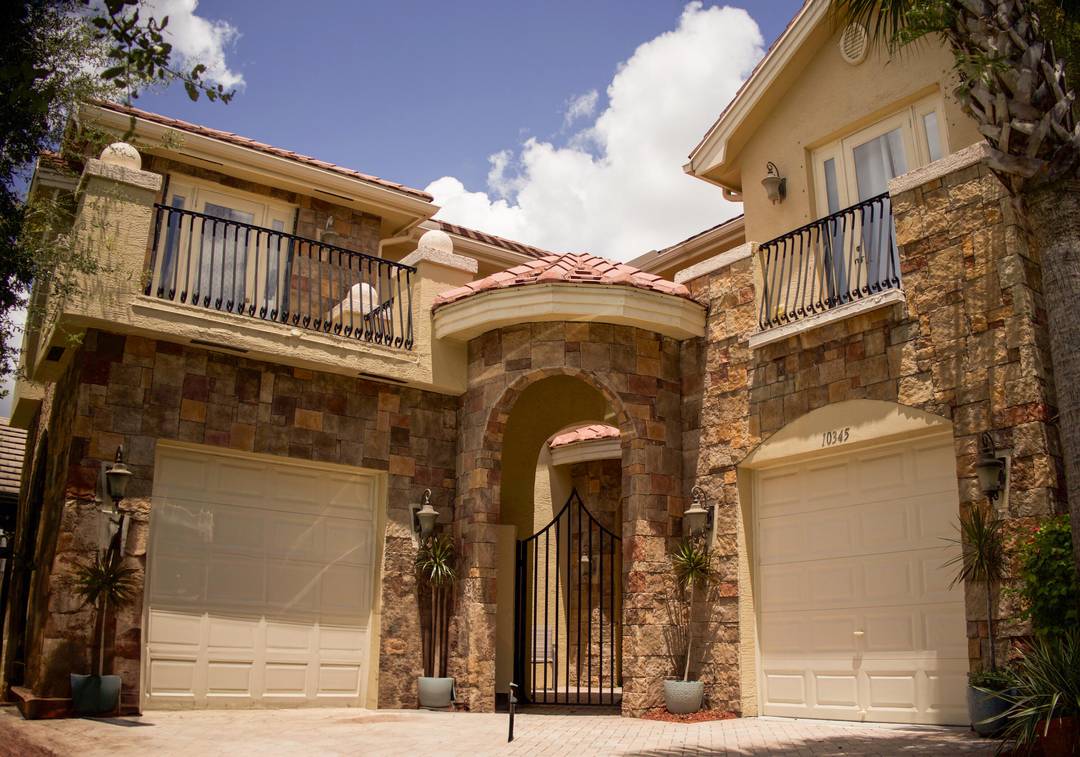 Welcome to this spacious and elegant single family home in the highly sought after gated community of Versailles.