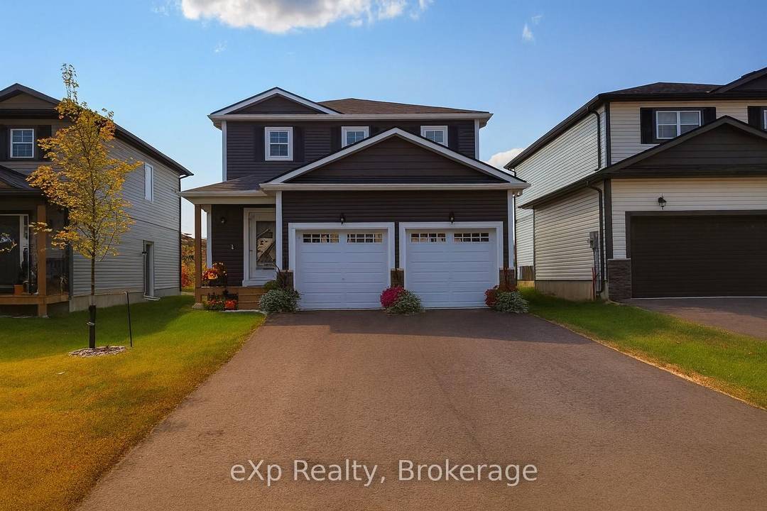 Welcome to 50 Quinn Forest Drive, a stunning 4 bedroom, 2.