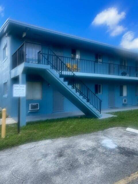 Great 2 1 condo second floor unit, all tile fllors window a c units.
