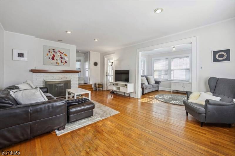 Picture perfect, sun drenched Colonial in the MOST convenient, QUIET sidewalk neighborhood.