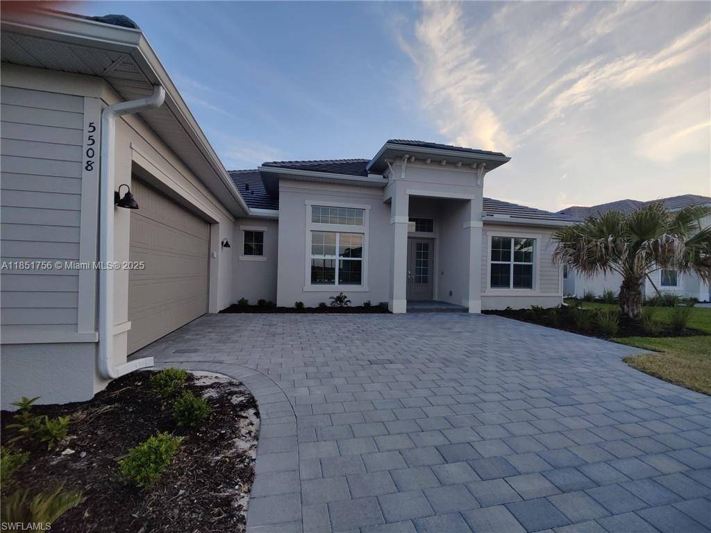 This stunning Lakeside model home featuring panoramic lake and golf course views.