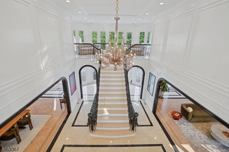 Tucked behind the gates of prestigious Llewellyn Park, this distinguished estate blends timeless elegance with modern luxury on nearly 2 acres.