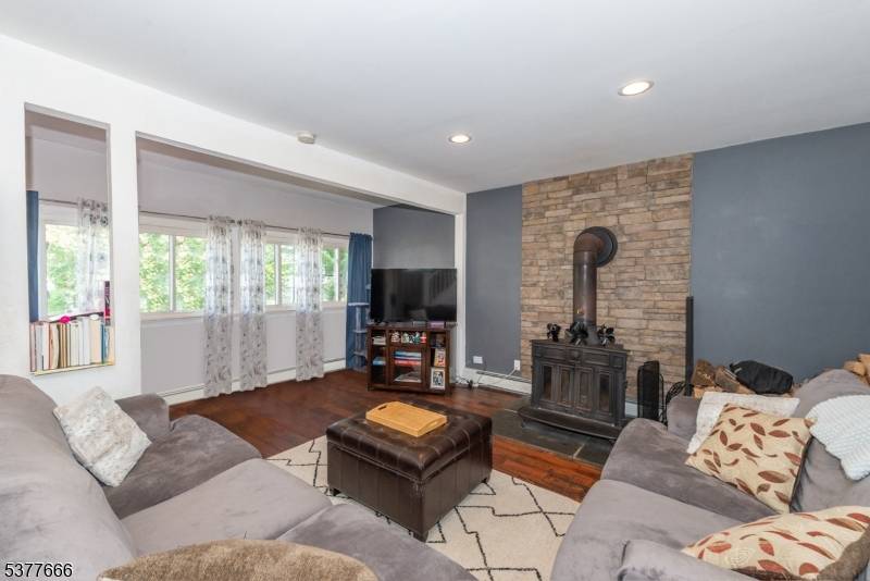Welcome to 134 Dewey Avenue, a modern haven nestled on a quiet street in Totowa, NJ.