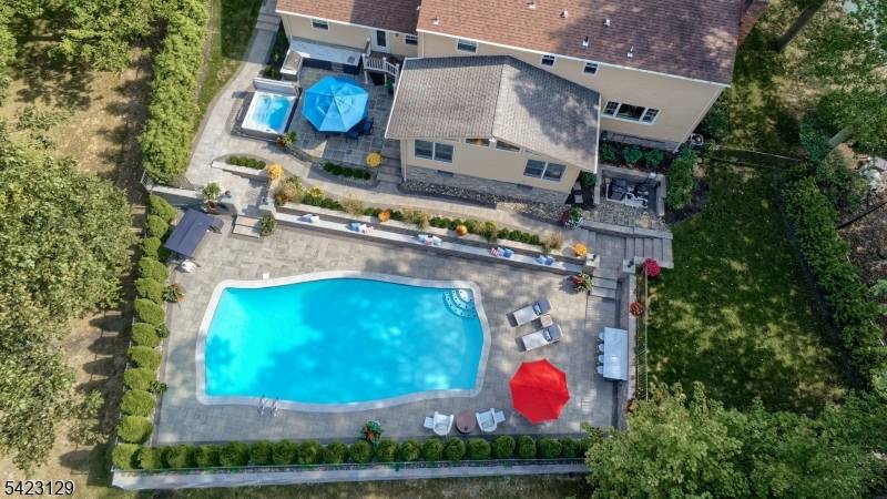 Tucked away on a cul de sac in sought after Packanack Lake, this meticulous Colonial offers 4 Bedrooms, 2.