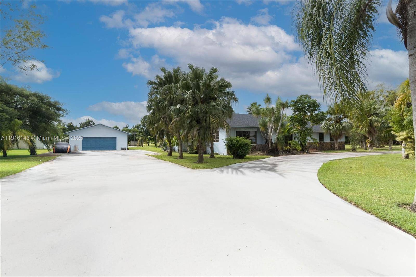 Fantastic 4 bdrm, 2 bath home 1 bdrm 1 bath separate living quarters, on a 4 acre gated, fenced lot in Homestead.