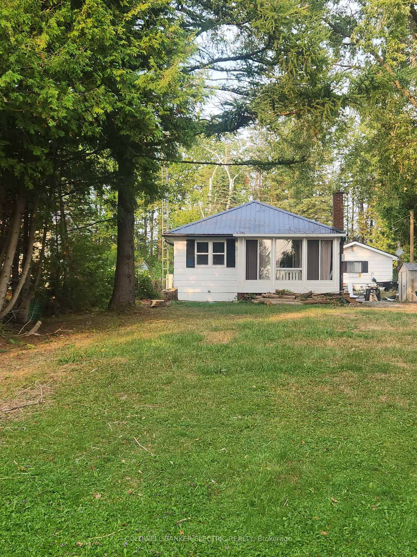 Waterfront Weekend Wonder at Mitchell Lake Welcome to your private slice of serenity 70 feet of lakeside charm with breathtaking westerly views that turn every sunset into a fiery masterpiece.