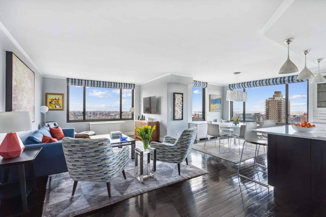 Sky High Living with Unmatched Views Perched on the 38th floor, this exceptional 2 bedroom, 2 bath residence can be effortlessly converted into a spacious 3 bedroom home.