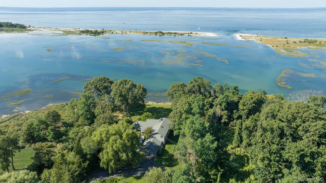 WATERFRONT Fabulous water views of Flax Pond and Long Island Sound in the Inc Village of Old Field's Crane Neck Beach Association.