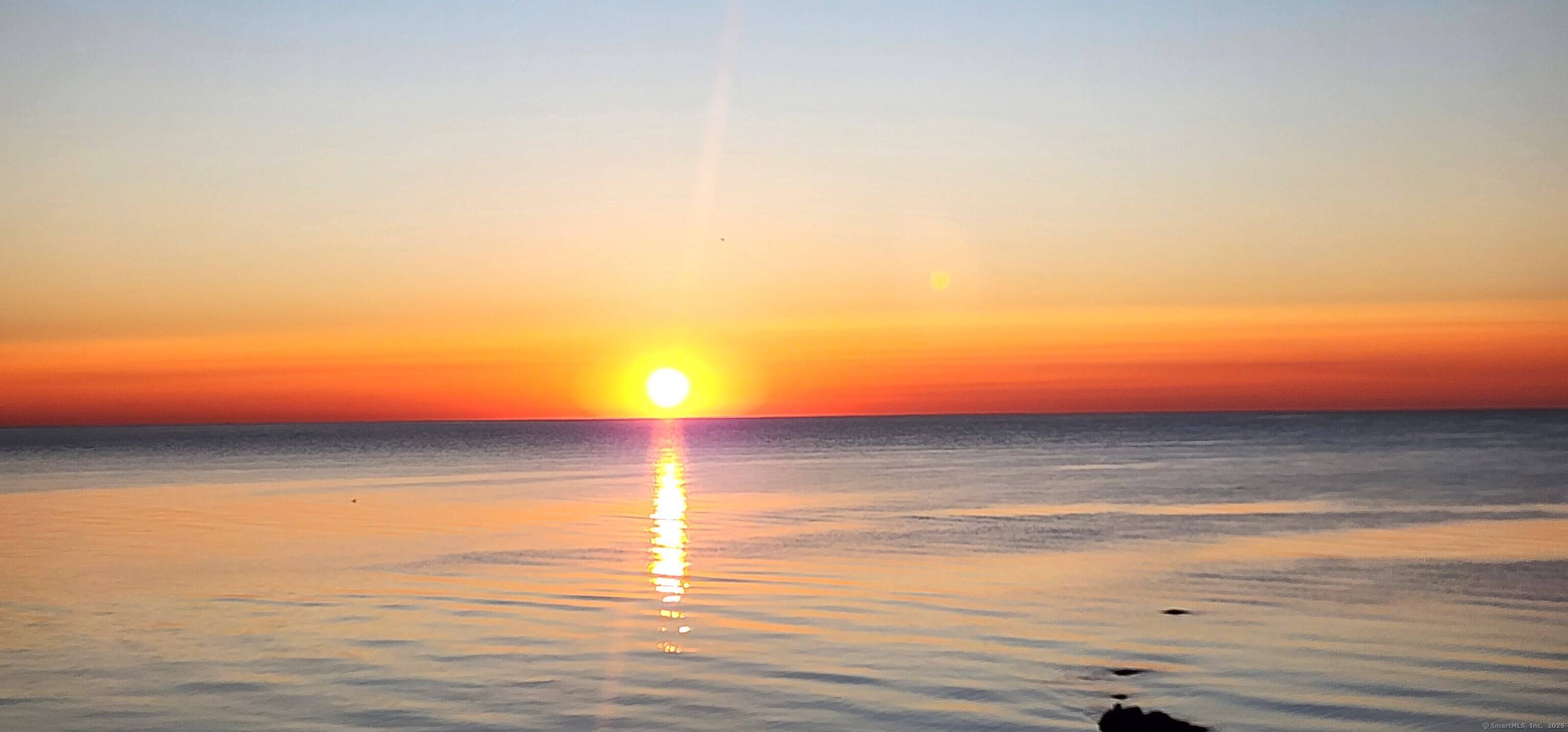 This DIRECT WATERFRONT. Spectacular Sunrise views of Long Island Sound with a fully updated interior.