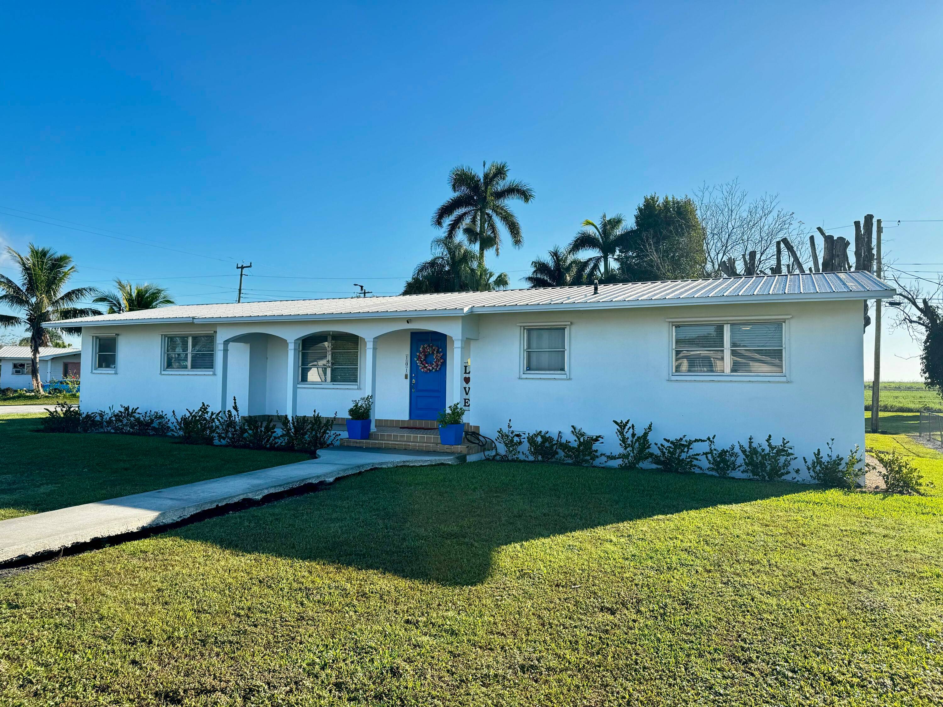 Welcome to this charming 4 bedroom, 2 bath home situated on a spacious corner lot with no neighbors behind you, offering unparalleled privacy and tranquility.
