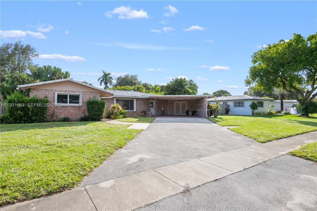Welcome to 5334 Balsma Ter, located on a quiet, tree lined street in Plantation Gardens.