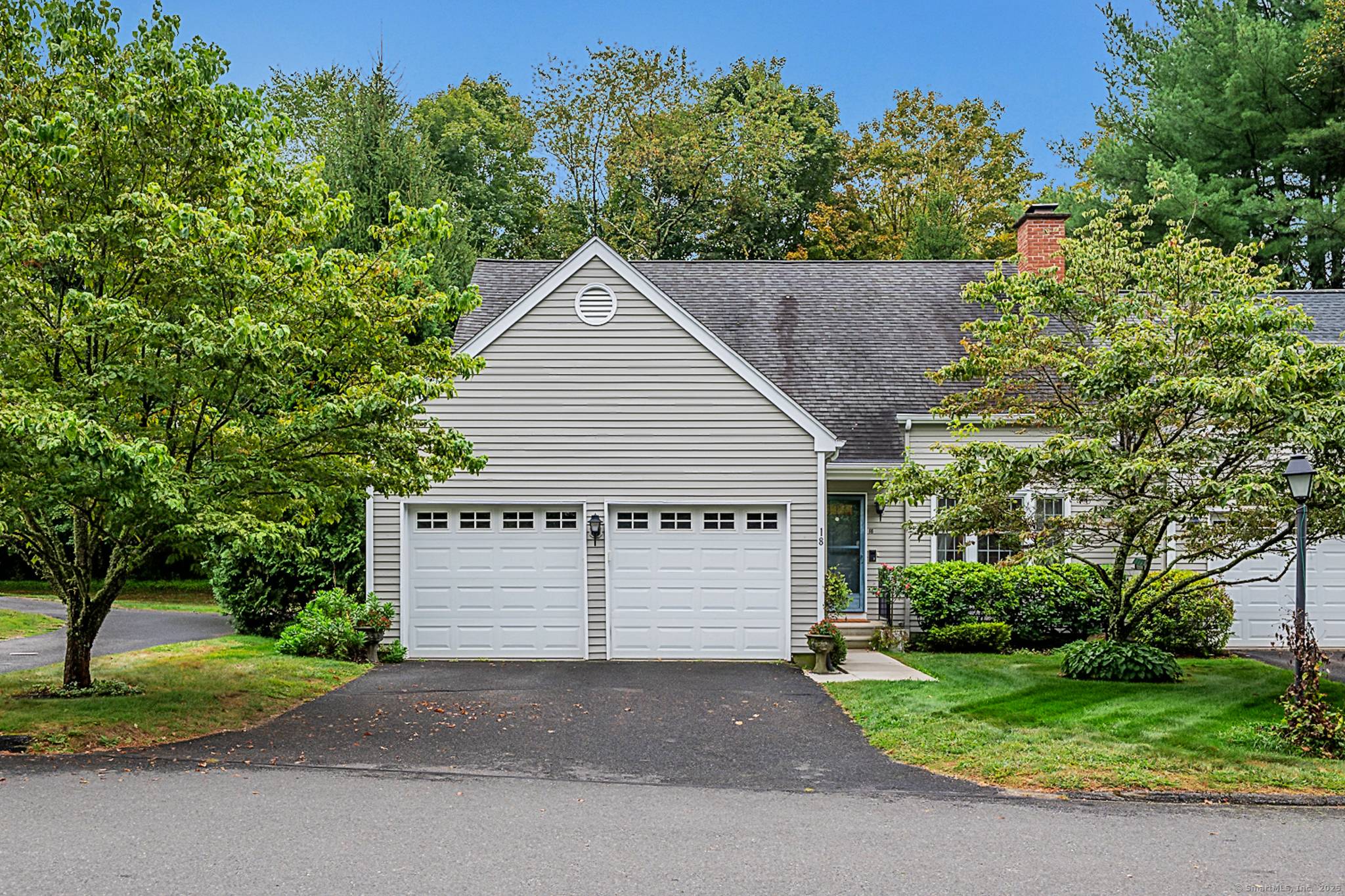 Experience the charm of Woodbury's most desirable condominium community at 18 Woodbury Hill.