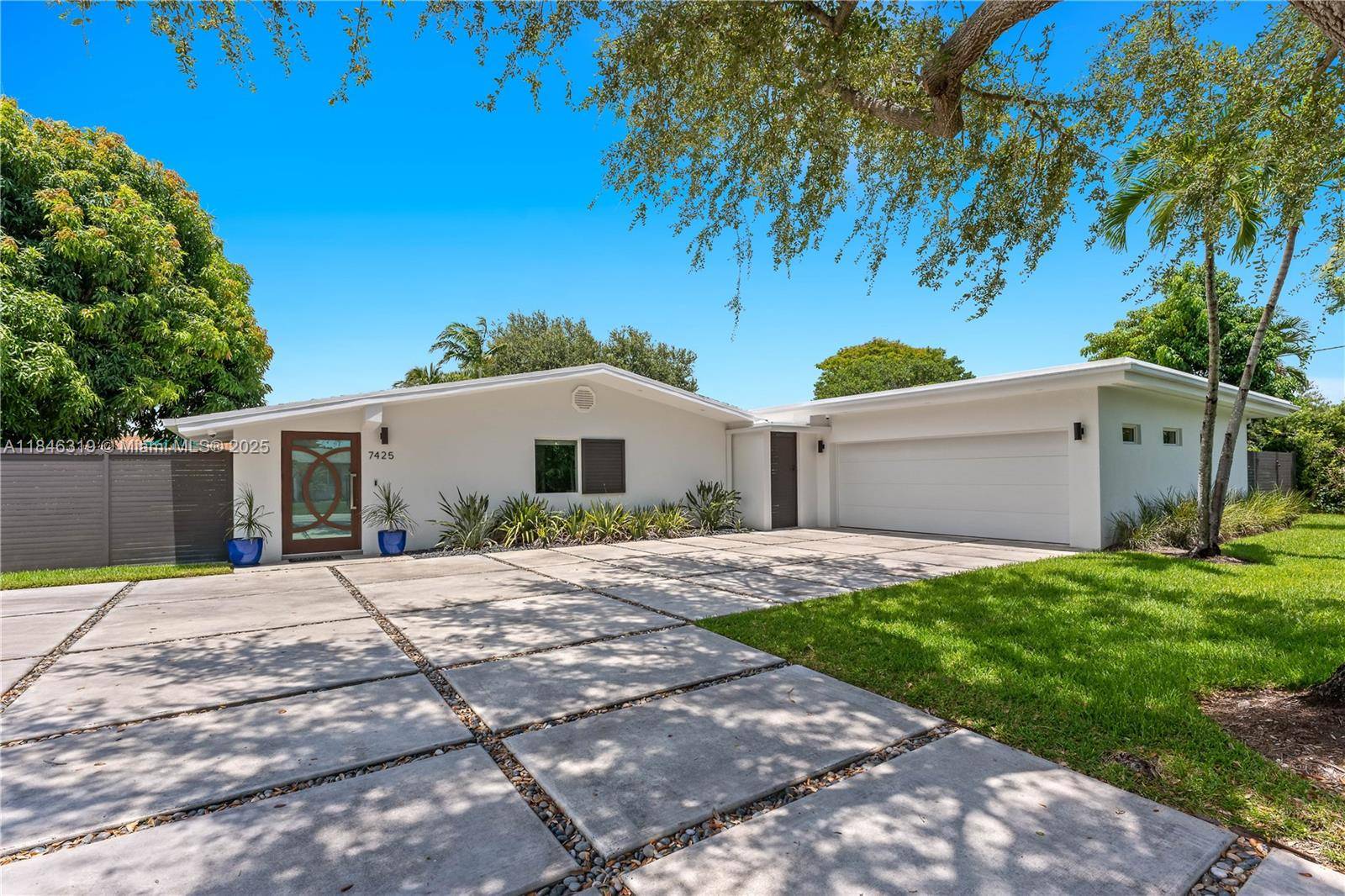 Discover the charm of this unique tropical oasis single family home, featuring a detached accessible dwelling unit DADU Renovated from the floor level up to the trusses across all 3 ...