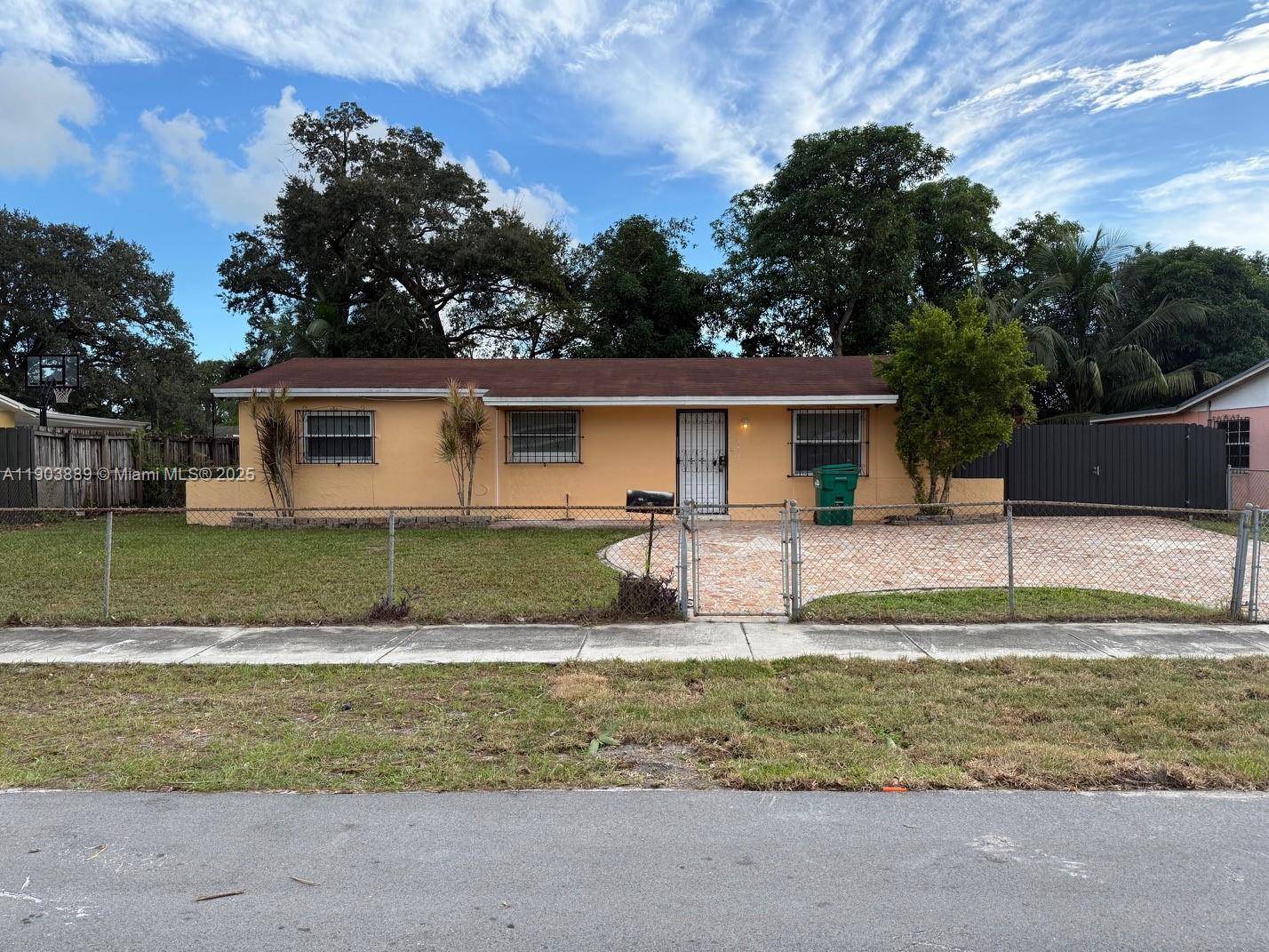 Charming 3 bedroom, 1 bath with ample parking and 7500 SQ FT Lot lot home in Miami Gardens.