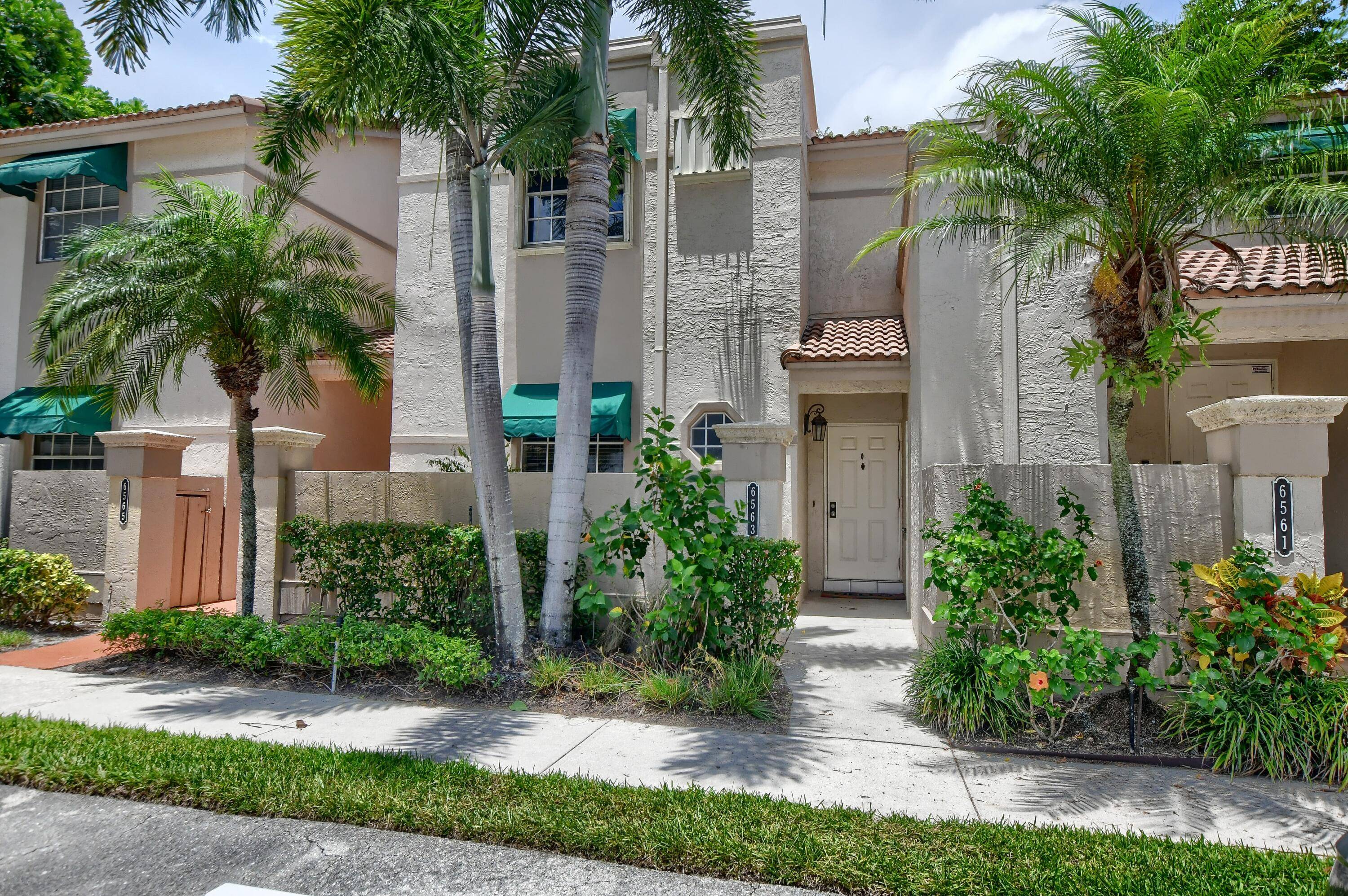 Experience comfortable living in this beautiful first floor garden apartment, featuring tile floors in the main living areas and carpet in the bedrooms.