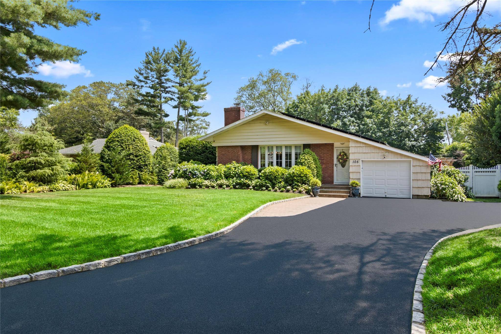 If you want privacy and easy living, welcome to 105 Midway Ave !