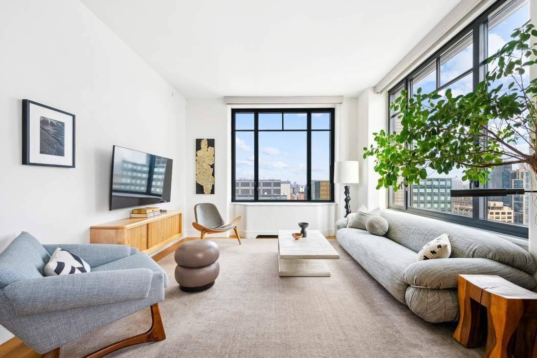 Move right into this corner two bedroom, two bathroom condominium home with open city and river views.