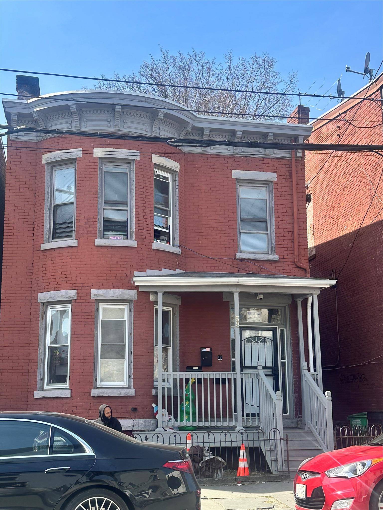 Welcome to 52 Lander St., Property offers a shared entrance with one apartment down stairs and one upstairs.