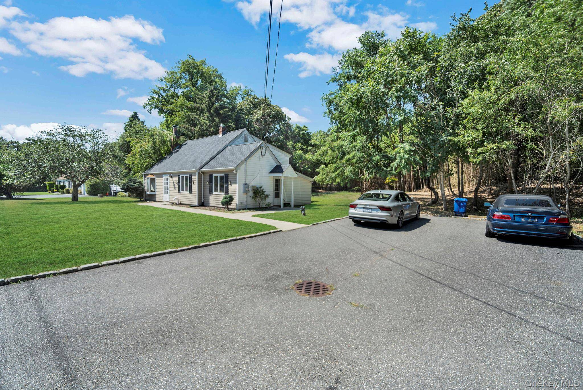 Welcome to this updated 4 bedroom, 3 bath ranch nestled on a spacious 1 acre lot in the highly sought after Smithtown Possible subdivision.