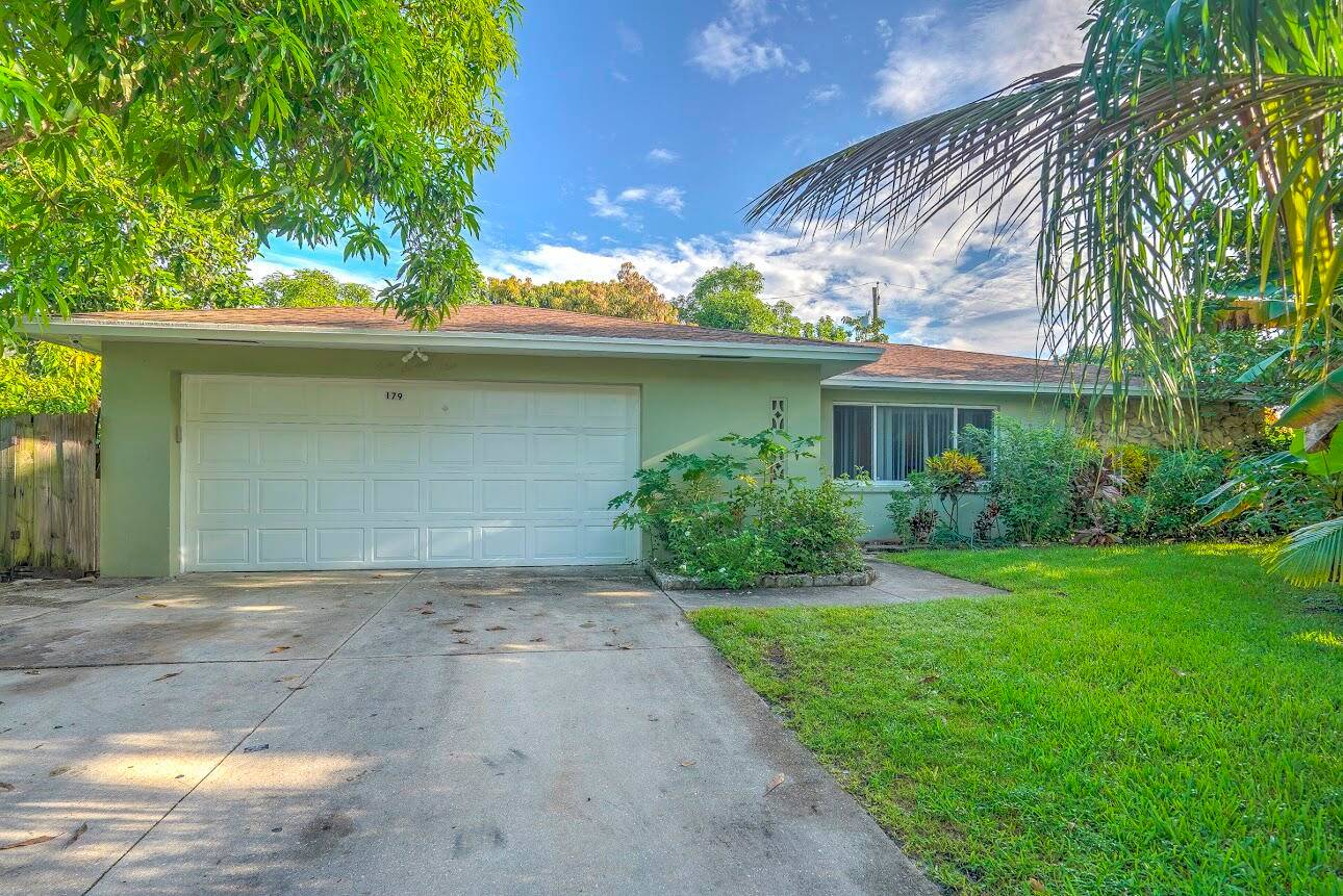 Bring your suitcases and move into this hidden oasis in the heart of Boynton Beach.