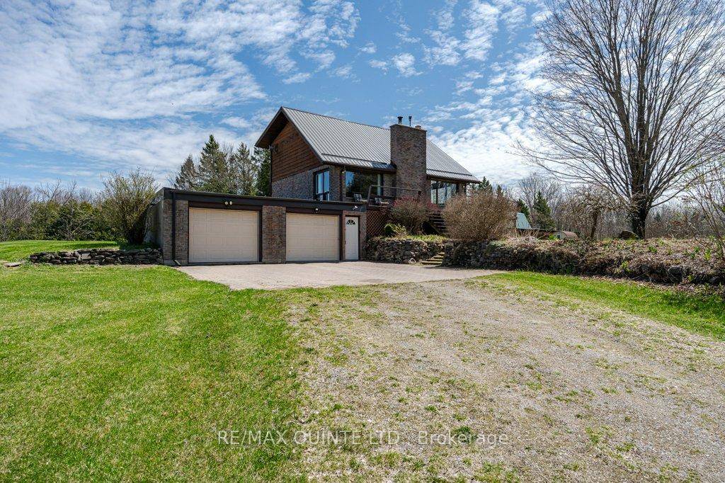 If you're looking for a hobby farm this unique custom built home with barn and 20 acres could be your next home !