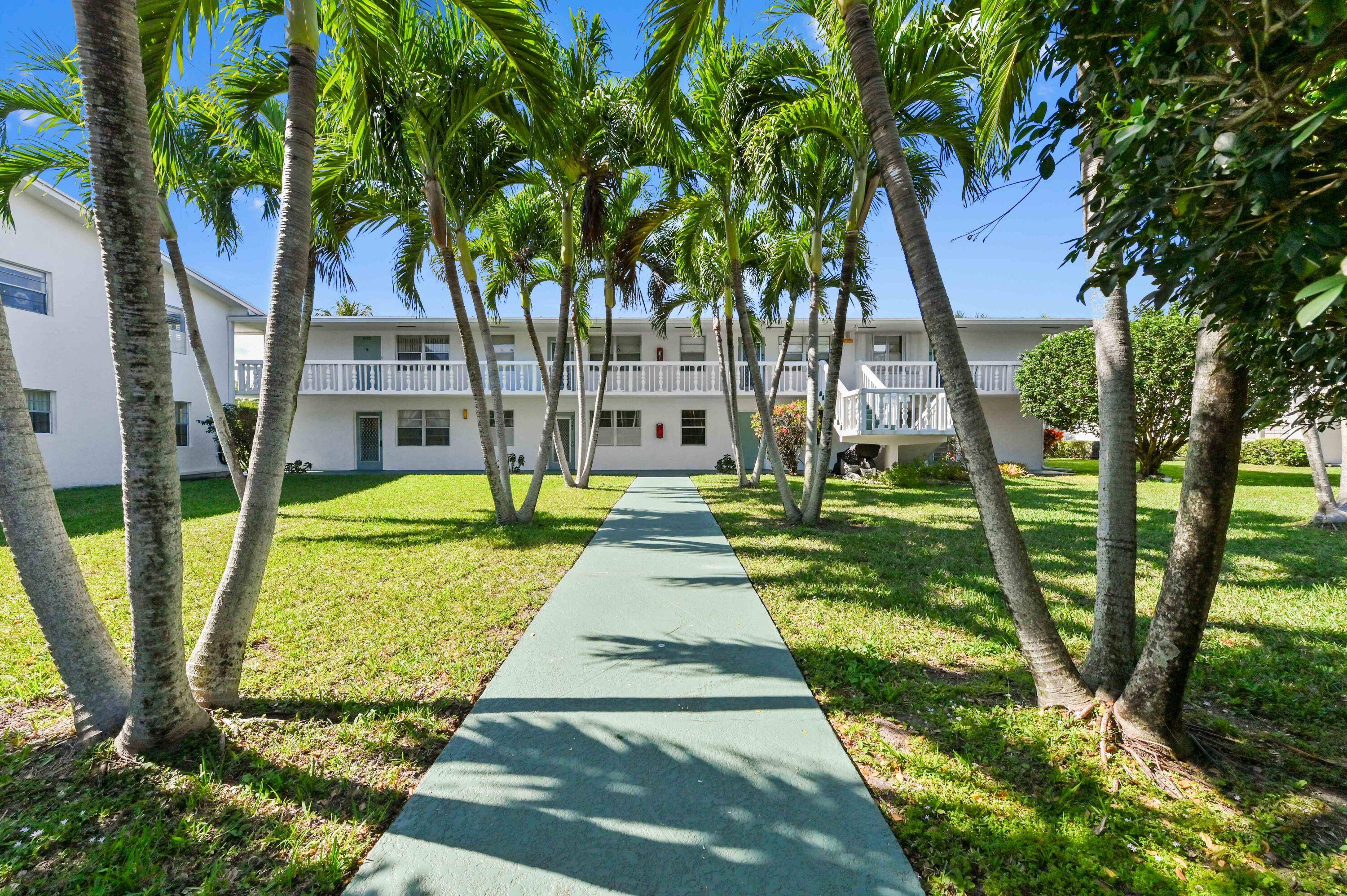 Discover the perfect blend of comfort and convenience in this rare to market first floor CORNER UNIT !