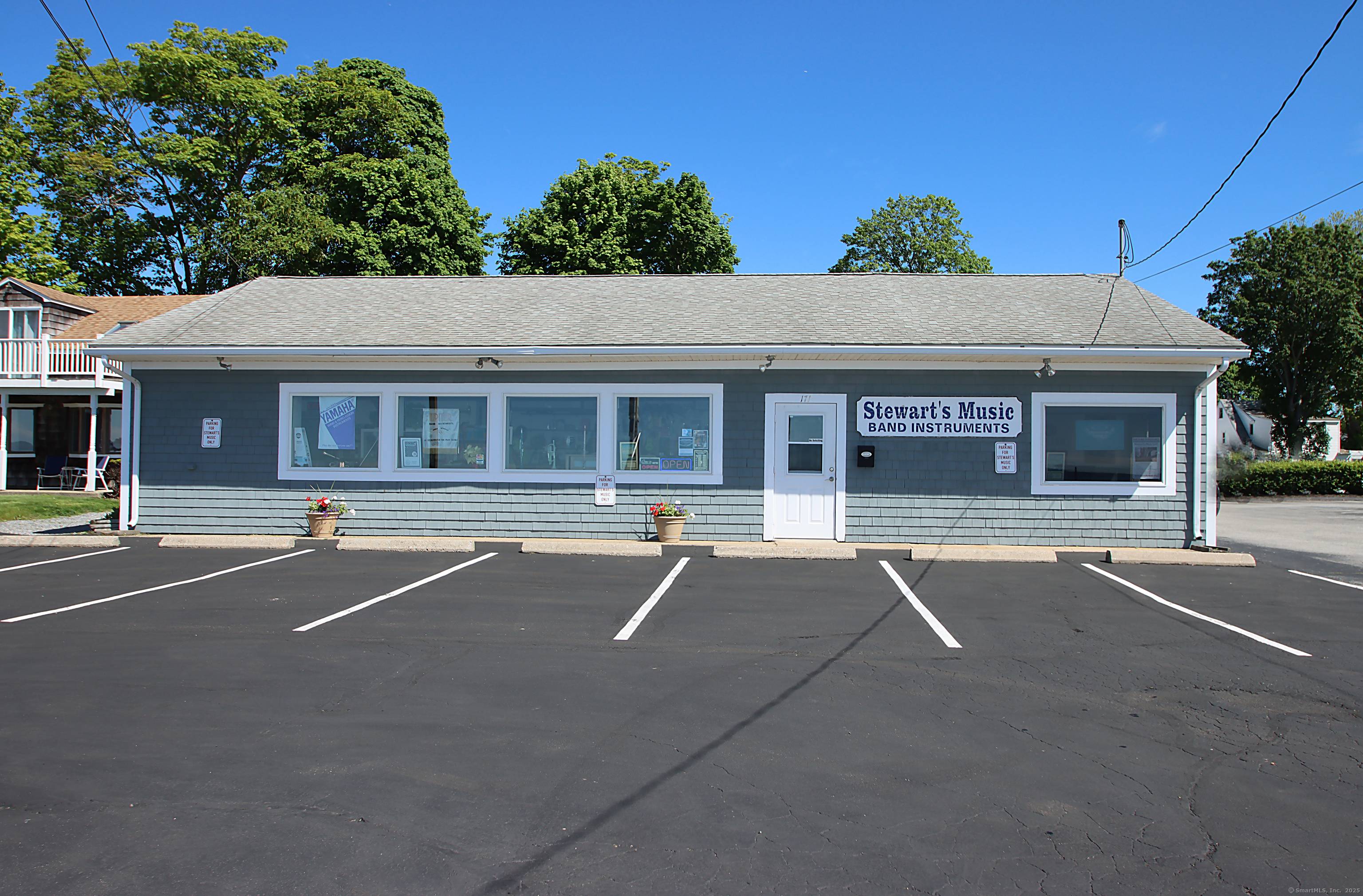 This is a rare opportunity to own a unique property in the heart of Niantic Village on Main Street, featuring both panoramic water views and on site parking.