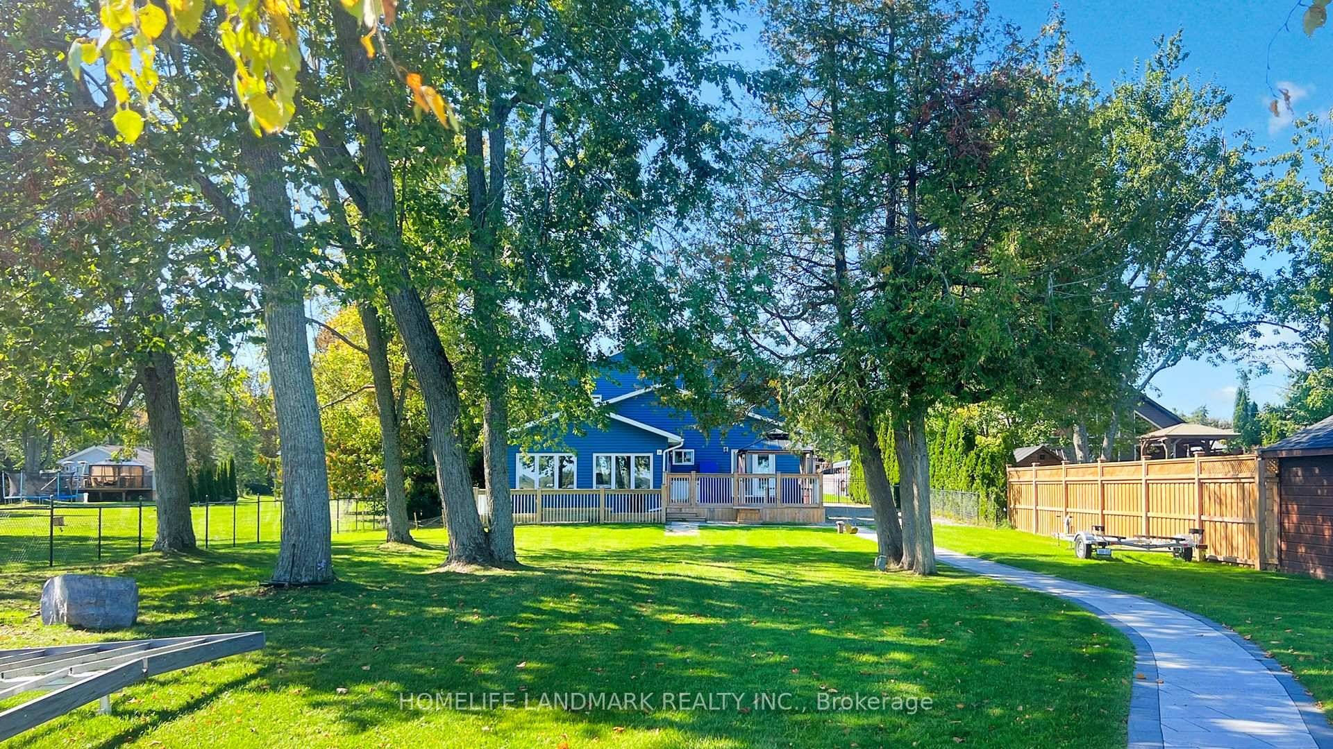 Welcome to your dream waterfront home at 208 Lakeshore Dr, Kawartha Lakes.